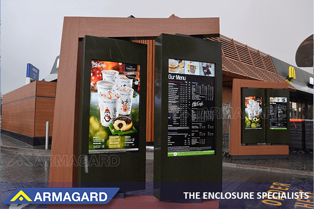 McDonald's drive thru lane with portrait outdoor digital menu board enclosures