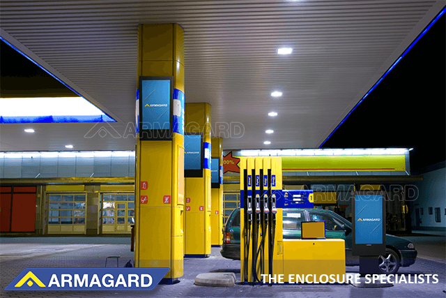 Visualized Armagard gas station enclosures installed wall-mounted and freestanding at a filling station