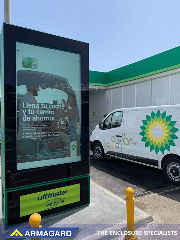 Freestanding digital advertising totem installed at a gas station