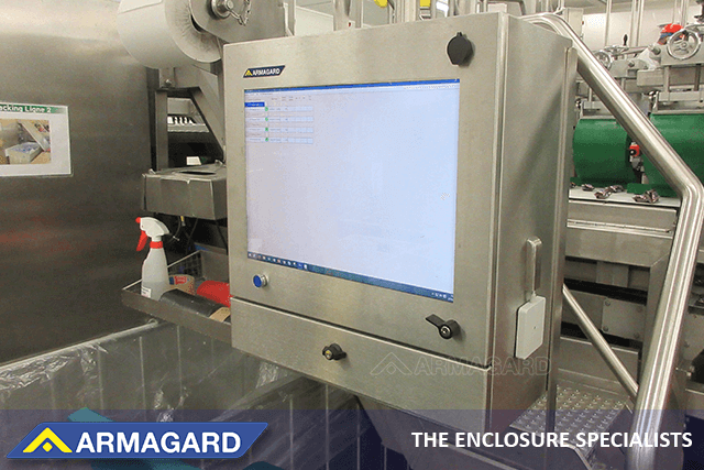 Washdown touch screen cabinet installed in a food processing plant