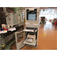 An Industrial Computer Cabinet on a Warehouse Floor