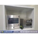 A waterproof printer enclosure and touch screen computer housing integrated into a food processing facility