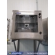 Front view of the SPRI-400 NEMA 4X printer protection enclosure wall mounted in a food processing facility