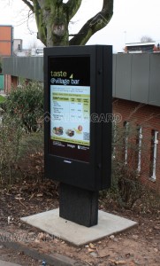 Outdoor advertising totem enclosure on a university campus