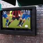 outdoor tv enclosure used in a pub beer garden